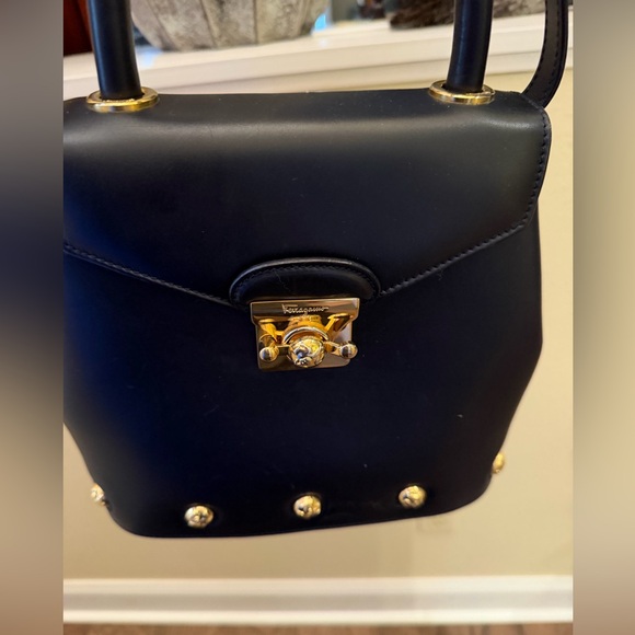 Salvatore Ferragamo Handbags - Salvatore Ferragamo Black Bag with Gold Details
EUC